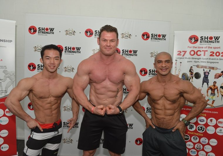 7 SFBF President Alex Michael Betts flanked by competing athletes Roy Chua left and Daniel Lino right
